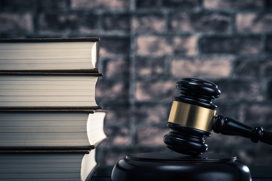 金山區(qū)刑事律師解讀偽造貨幣數(shù)額與犯罪構(gòu)成