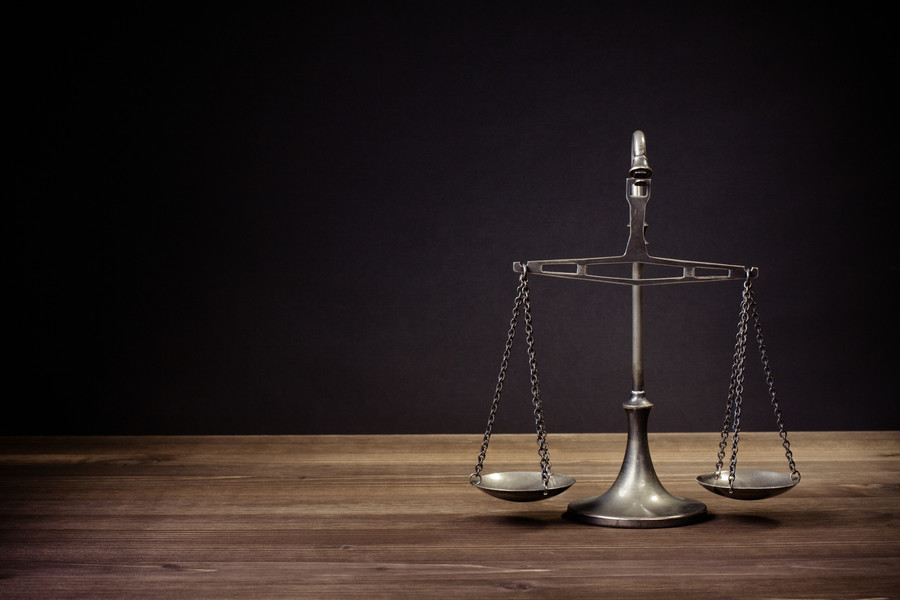 上海刑事律師解讀：冒充國家機關(guān)工作人員進行詐騙的罪行認定